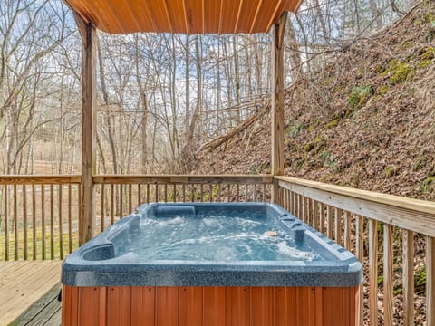 Soak your worries away in your private hot tub, sheltered under a wooden canopy with peaceful forest views all around you.