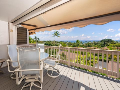Wake up to this breathtaking tropical vista from your private balcony—palms swaying, ocean breeze, and endless horizon. Your morning coffee never had a better view.