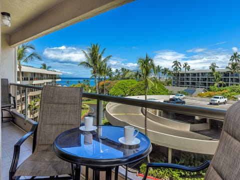 Picture yourself sipping morning coffee on your private lanai, where swaying palms frame stunning ocean views and tropical breezes invite you to unwind in paradise.