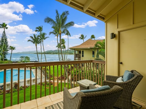 Relax on your private lanai, where tropical breezes and stunning ocean views create the perfect backdrop.