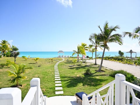 Welcome to Leisure Beach Ocean Retreat, steps from the warm, calm Caribbean.