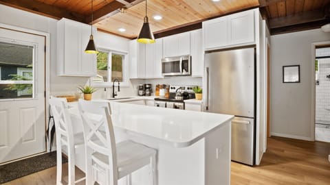 Full kitchen with dishwasher