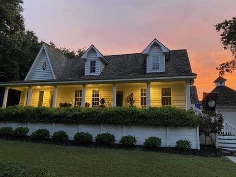 A quiet summer evening at the Pearl. The property extends around a courtyard. 