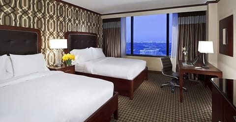 Unwind in crisp beds with soothing skyline views beyond.