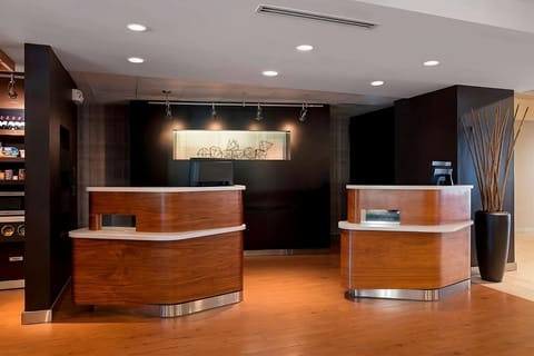 Arrive with ease at a sleek, welcoming front desk.