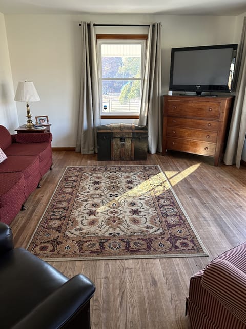 Large living room with smart TV for relaxing. 