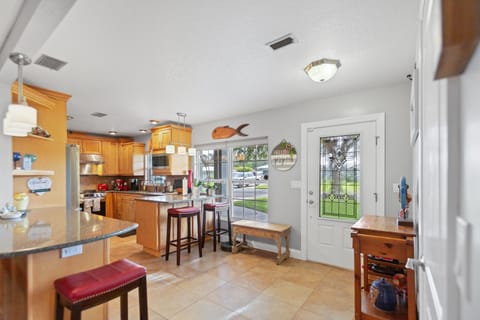 front door and kitchen