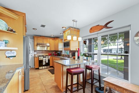 Fully stocked Kitchen with dishwasher, knock nock refrigerator. 