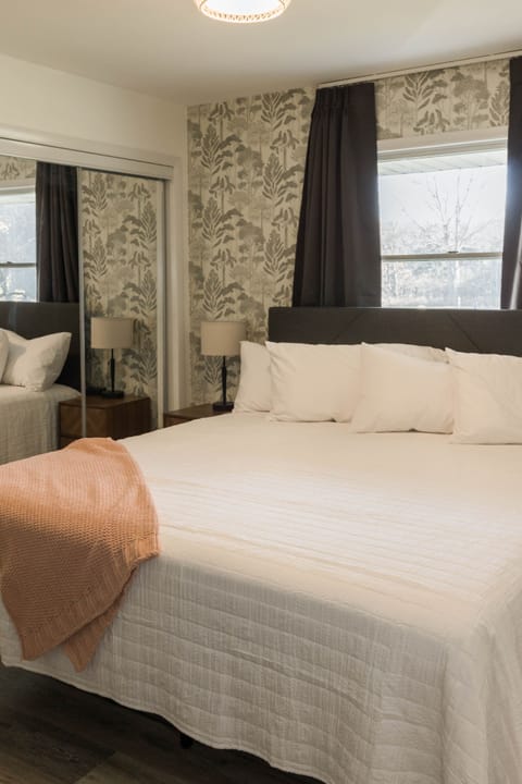 Tree bedroom on 1st floor with king bed.  Additional bedding in closet.