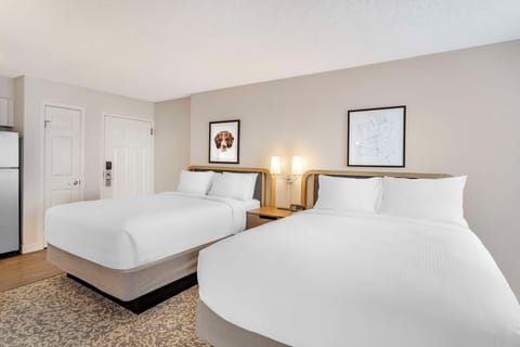 Spread out comfortably with two beds and warm bedside lighting.