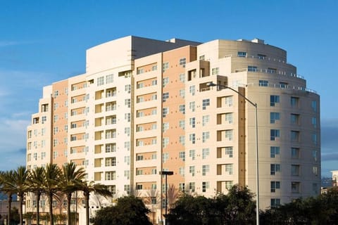 Arrive in style at this modern, sunlit high-rise escape.