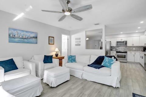 The family room -with the dining room and kitchen beyond
