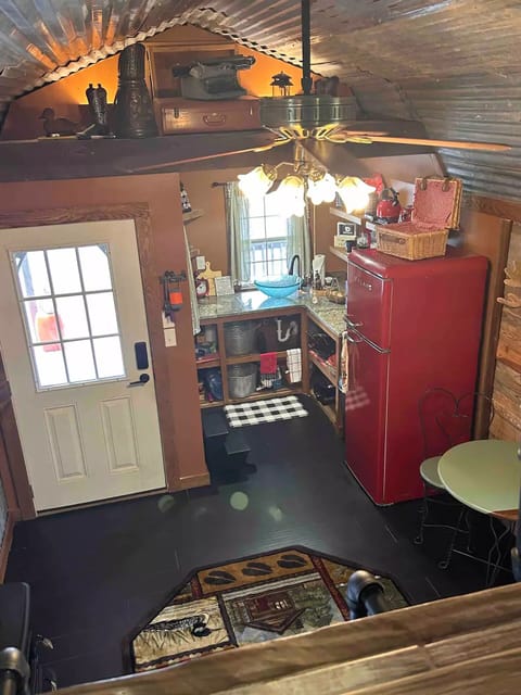 The red retro kitchen has everything you need to whip up delicious meals.