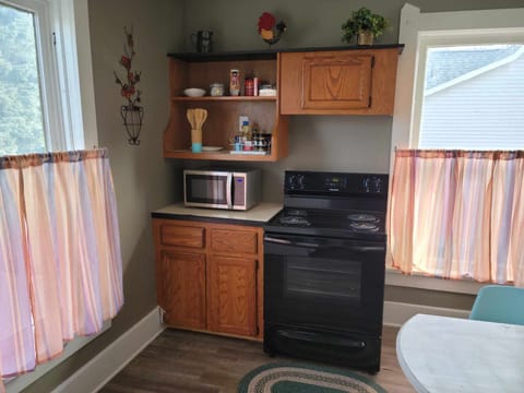 Full kitchen with microwave, coffee/tea area
