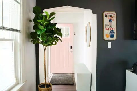 Welcome to the Pink Door Place. Feel at home in this cozy, chill spot!