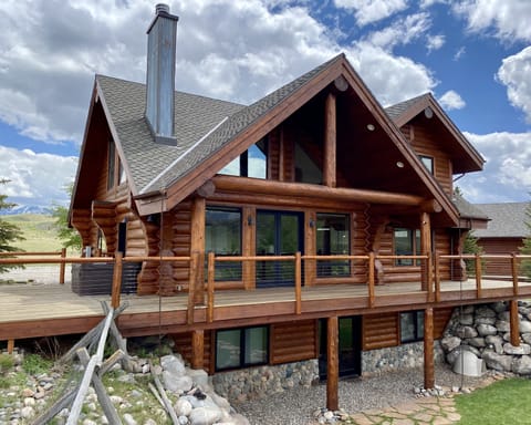 Hot tub on the left side of the deck.