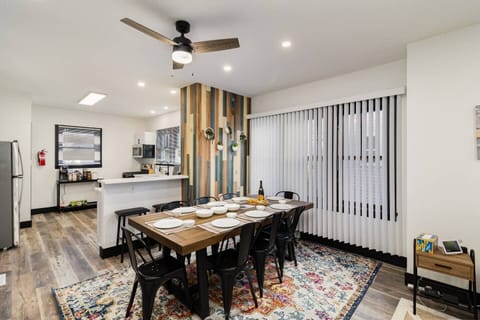 Dining table which can seat 8 people and Kitchen stools for 2