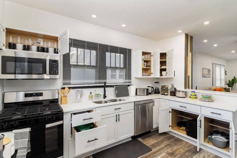 Fully loaded Kitchen with |Outdoor Dinning Set||kids dinnerware||Mixing Bowls||Sharp knife set||24 different spices||Blender||Kettle||Toaster||Paper Towl||Copping Boards||Water Filter||Cooking Spoons||Air Fryer||Plates||Cups||Dishes|