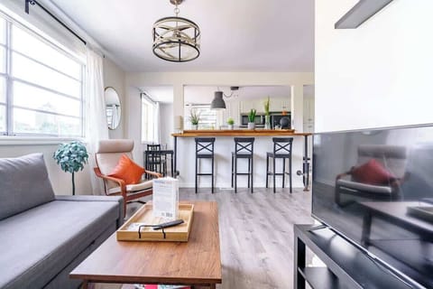 Step into our meticulously curated living room haven, meticulously designed for both comfort and sophistication. Our plush couch and elegant coffee table provide the perfect backdrop for relaxation or hosting guests, ensuring every moment is embraced