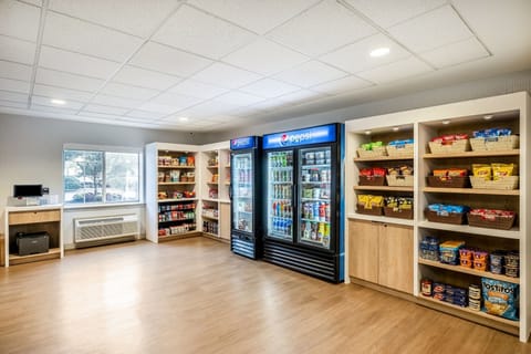 Browse a well-lit mini market for quick, tasty essentials.