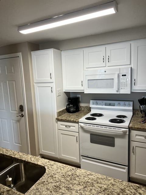 Kitchen with new cabinets and granite.