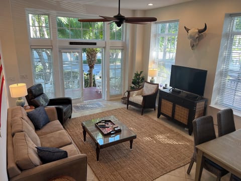 End unit brick townhome with 11' ceilings on the bottom floor and HUGE windows
