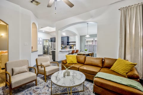 Unwind and connect in our warm, inviting living room space.