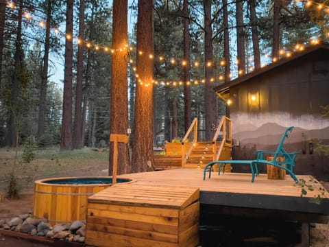 Plunge into the hot tub and relax as you soak in the views