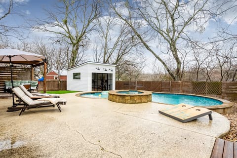 Your private oasis awaits - Dive into this expansive pool and unwind in the spa!
