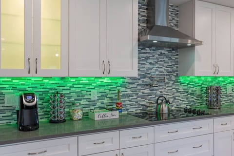Spacious LED lit kitchen counters provided with all cooking basics!