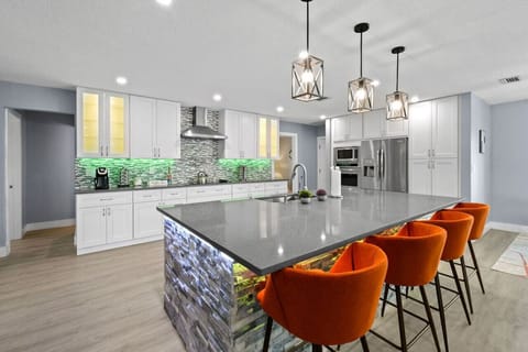 Prepare your inner chef to whip up gourmet delights while enjoying your family in an open concept living space.