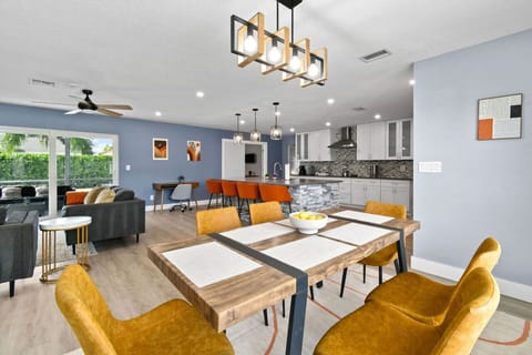 Gather around our inviting 6-person dining room table, perfect for intimate family dinners and game nights. Share laughter and stories as you savor delicious home-cooked meals together.