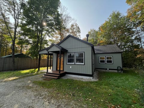 Front door with carport and parking space. Keypad entry.