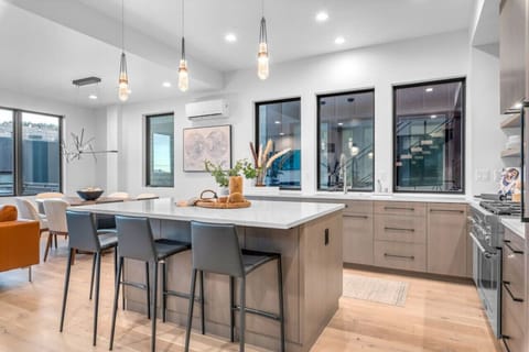 Host joyful gatherings amidst this sun-drenched, well-appointed kitchen.