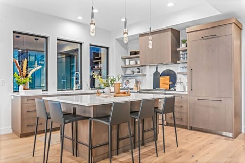 Savor meals and lively conversation in this artfully designed kitchen.