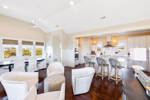 Multiple areas for gathering in large open top floor of home