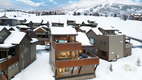 Winter aerial view of Nokota Lodge with Ski Resort view