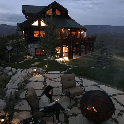 Firepit in yard overlooking home