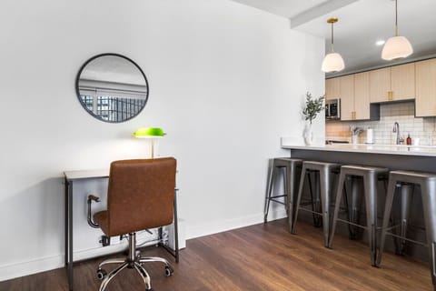 A functional desk space awaits you, perfect for getting a bit of work done. Picture yourself here, feeling productive and focused, whether you’re working or planning your next adventure.