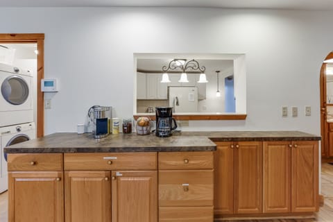 zoomed out view of the coffee bar, kitchen in the back