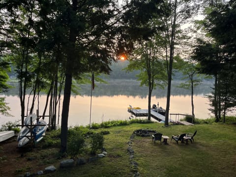 Sunrise from the deck overlooking the backyard and dock.