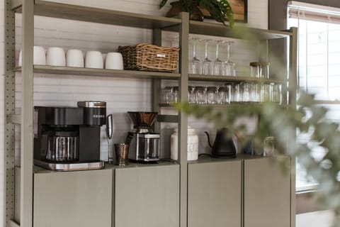 Fully stocked drinkware and coffee station will make your mornings a breeze!