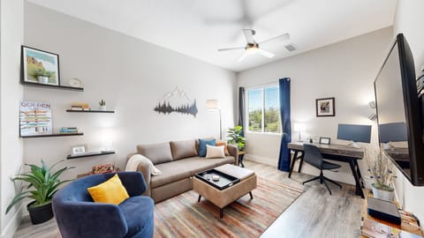 Stylish Living Room | Queen Sleeper | 55" Articulating Smart TV | Desk & Monitor