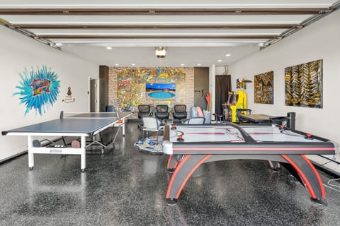 one of a kind recreation room.  every kids dream room.  ping pong, air hockey, free standing arcade games, even a 65" huge tv for Super Mario Brothers.  Hours of fun in a temperature controlled room.  Come see this unique play area.