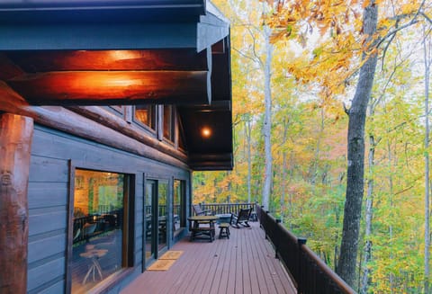 Embrace the serenity of nature in our cozy cabin, surrounded by towering trees and rustic charm, offering a perfect retreat for your peaceful getaway.