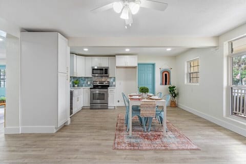 REFRIGERATOR INCLUDED with water dispenser, but not shown. Open concept kitchen & dining room!