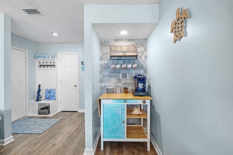 Brew, relax & enjoy peaceful lagoon views from your private Gulf Shores balcony.