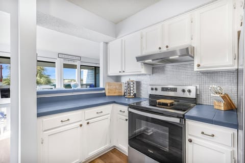 A kitchen made for gathering—bright, stocked, and ready for you.