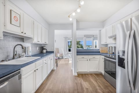Wake up to lagoon views and coffee in a fully stocked, homey kitchen.