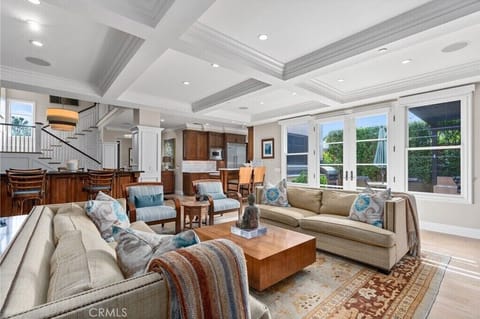Relax in this beautiful zen living room facing a private garden view. 